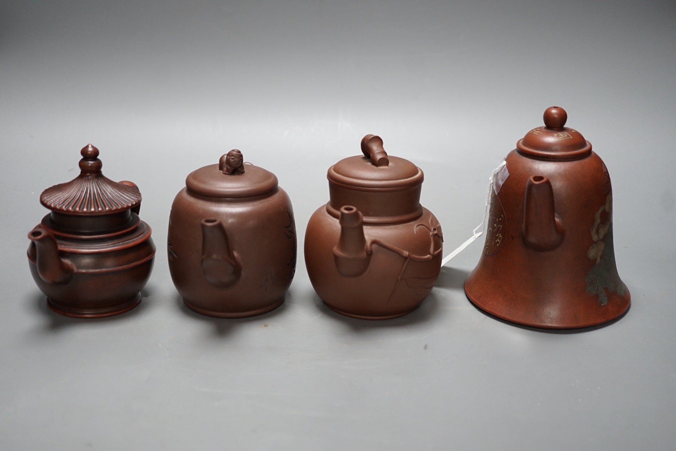 Four Chinese Yixing teapots, tallest 13cm